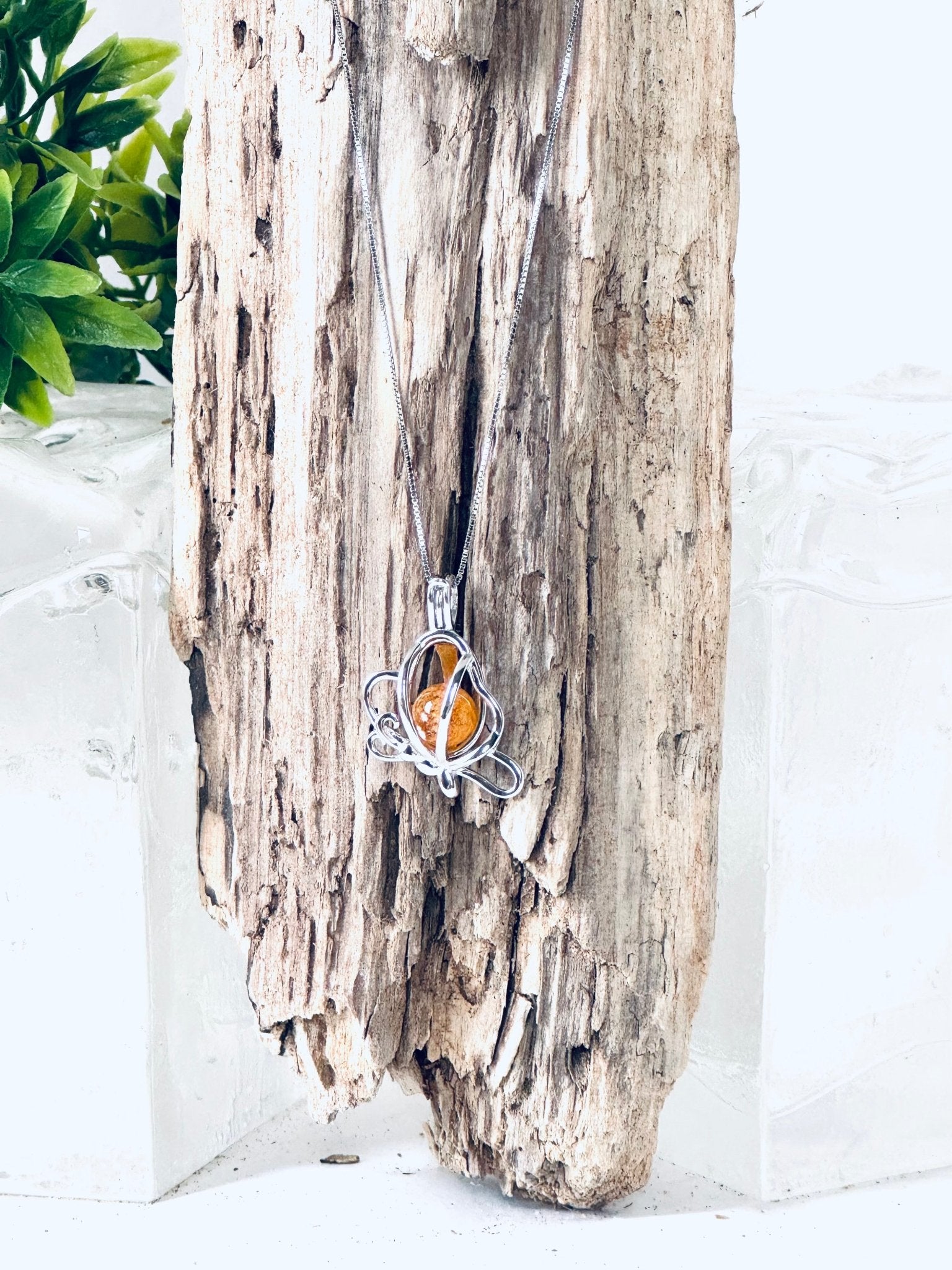 Collier "Bille de mémoire" (papillon) pour cendres funéraires - La Meduse - Verre soufflé